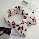 Load image into Gallery viewer, Edge Protector. Hair Band. Animal Print. Animal Print Hair Band. Bowtie headband. hair back and keeps your edges in place while washing your face or doing makeup.
